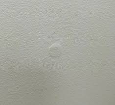 Drywall Nail Pops Down a Wall or Ceiling on an Alabama home, photographed on an APS Foundation job site