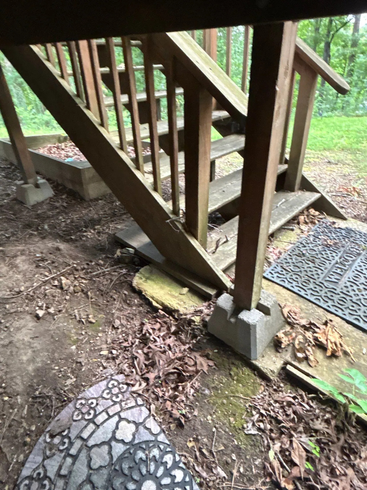 APS Foundation Repair and Waterproofing repairing sinking outdoor stairs with uneven concrete blocks in Helena, AL.