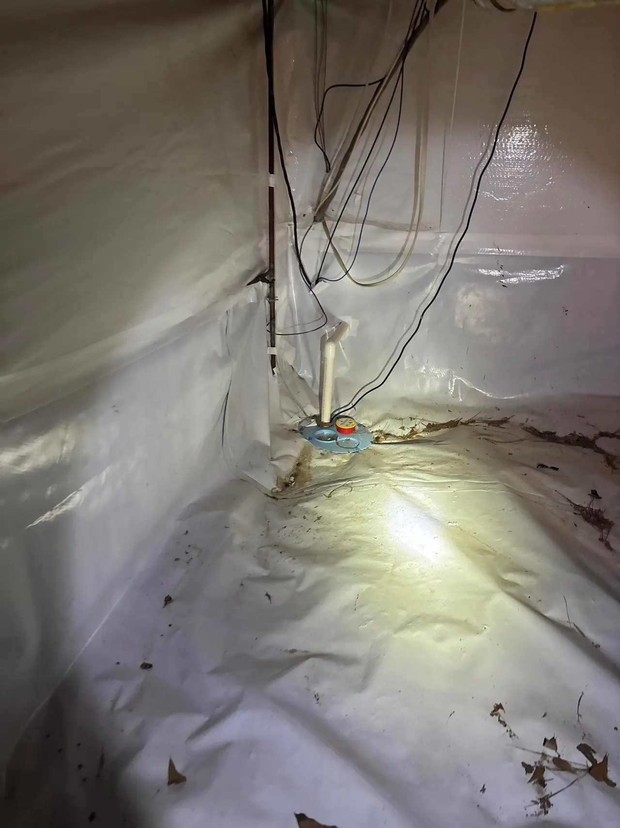 APS Foundation Repair and Waterproofing installs crawl space vapor barrier and sump pump for moisture control in Birmingham