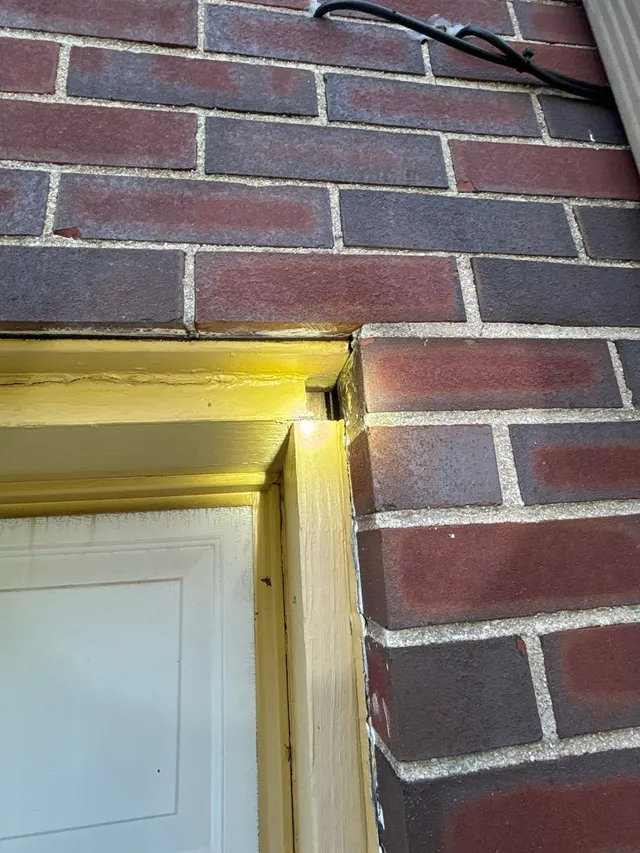 Sticking Doors & Windows on an Alabama home, photographed on an APS Foundation job site