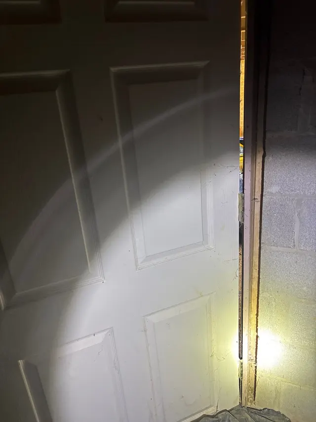 Sticking Doors and Windows on an Alabama home, photographed on an APS job site