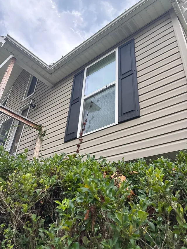 Clogged Gutters on an Alabama home, photographed on an APS Foundation job site