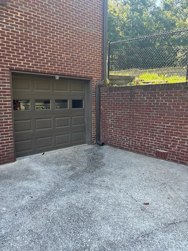 Cracked Driveway on an Alabama home, photographed on an APS Foundation job site