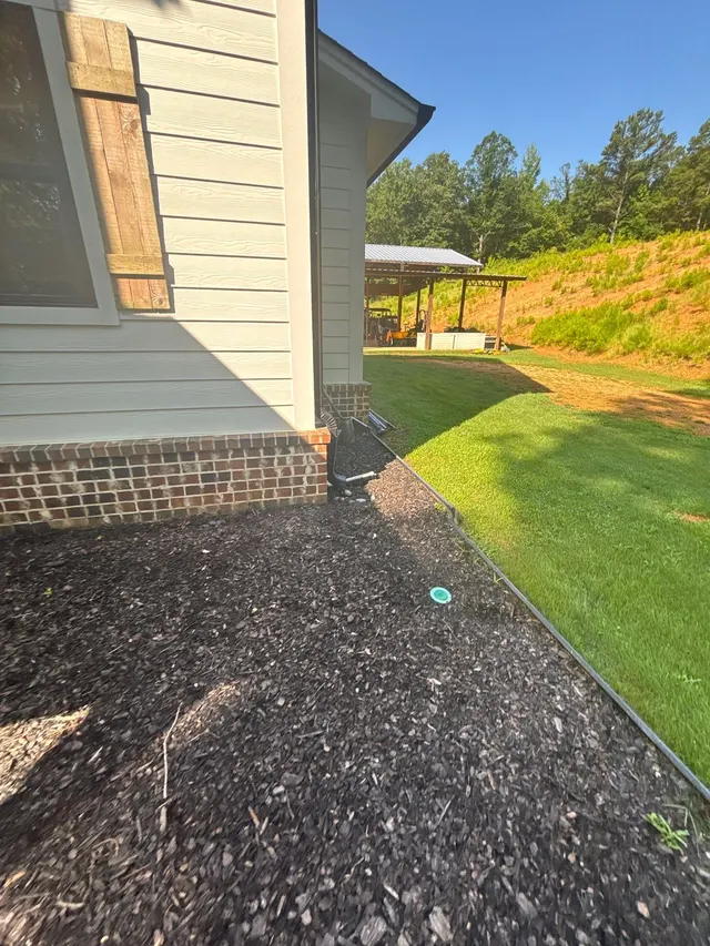 Improper Drainage Around the Foundation on an Alabama home, photographed on an APS Foundation job site