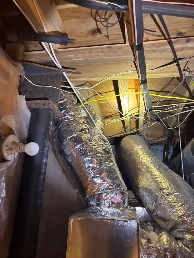 Condensation on Ducts and Pipes on an Alabama home, photographed on an APS job site